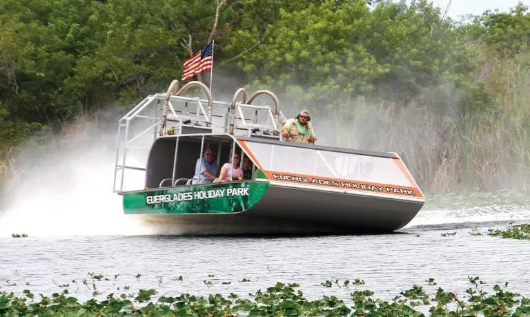 Air boat Carrying Tourists Through Everglades Waterways